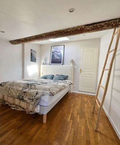 Appartement ancien rénové de type 3, avec cave et stationnement