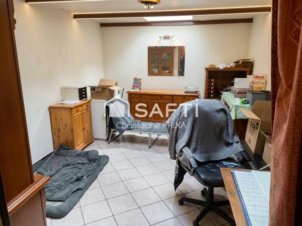 Immeuble à usage commercial de 160m² au sol