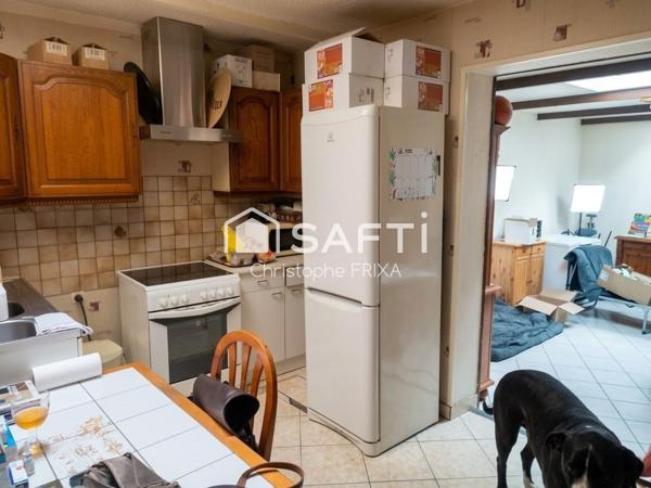 Immeuble à usage commercial de 160m² au sol