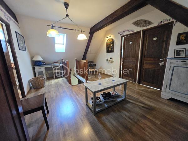 Magnifique Pavillon sur sous-sol de 177m² à Marzy

Exclusif chez BSK Immobilier!!!

Dans le village très prisé de Marzy,  situé proche de toutes les écoles,  les commerces et les commodités, nous vous présentons ce magnifique pavillon élevé sur sous sol construit en 1984, d'une superficie habitable de 177m², comprenant 5 pièces dont salon séjour avec cheminée, cuisine indépendante aménagée et équipée, wc, salle de bain, 2 chambres au rez-de-chaussée, grand palier, dressing, 2 chambres, wc et salle d'eau à l'étage, cellier, cave, buanderie aménagée, grand garage de28m², terrasses et dépendance de jardin, le tout sur un beau terrain d'environ 1000m², arboré, entretenu et entièrement clos avec une vue imprenable sur la campagne Nivernaise .

Au rez-de-chaussée, ce pavillon propose une spacieuse entrée ainsi qu'un dégagement qui dessert toutes les pièces de la maison notamment un grand salon séjour de 32 m², pièce de vie lumineuse qui propose un insert de cheminée, pour de belles soirées au coin du feu, ainsi que deux belles portes fenêtres qui donne sur une grande terrasse en bois.
Le dégagement dessert une grande cuisine indépendante, aménagée et équipée de 23m².
Le rez-de-chaussée se complète de 2 chambres de 11 et 15m², une salle de bain et un wc indépendant.

De la cuisine, un escalier mène à l'étage, dont le grand palier de 25m², dessert deux chambres de 16 et 21m², la plus grande offrant un espace dressing.
L'étage se complète d'une salle d'eau avec wc,, d'un grand dressing et d'une pièce de rangement .

Au sous sol, ce pavillon propose un espace buanderie de 16m², un cellier de 15m², une pièce de rangement de 13m², un atelier de 20m², une cave, ainsi qu'un grand garage de 27m² avec porte de garage motorisée.

Tous les sols de cette maison sont en carrelage (Salon séjour, cuisine, salle de bain, wc, buanderie cellier, véranda, garage) mais aussi en parquet (palier et chambres), elle est composée d'un chauffage au bois (insert) ou électrique, d'une isolation double vitrage PVC imitation bois, ainsi que de volets bois standards.
Ce pavillon dispose de combles parfaitement isolés et d'une toiture en tuiles mécaniques bétons en très bon état.

Côté terrain, cette maison dispose d'un portail motorisé avec console d'accueil , d'une parcelle d'environ 1000 m² de terrain sans vis à vis entièrement clôturée, arborée et très bien entretenue, d'une terrasse en bois qui propose une vue imprenable sur la campagne Nivernaise,  de deux autres terrasses dont une sous appentis, ainsi que d'une dépendnace de jardin,
Côté assainissement, ce pavillon dispose du tout à l'égout conforme.
Il dispose de la fibre internet

Les plus de cette maison :
Sa proximité de toutes les commodités, des commerces et des écoles. La qualité générale du bien parfaitement entretenu avec des grands volumes de pièces dont son salon séjour, sa cuisine indépendante aménagée et équipée, ses 4 chambres et ses 2 salles de bains, sa buanderie aménagée, son garage, ses extérieurs et ses terrasses, son terrain parfaitement entretenu, arboré et totalement clôturé.

Des photos supplémentaires sont disponibles sur BSK IMMOBILIER > Nos conseillers > Olivier FRESLON
Pour tout renseignement complémentaire ou pour une visite, contactez moi au 07.62.78.13.13.

Idéale pour une grande famille, cette maison est un vrai coup de cœur, une opportunité à saisir!!!