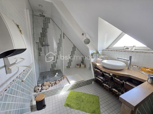 Magnifique Pavillon sur sous-sol de 177m² à Marzy

Exclusif chez BSK Immobilier!!!

Dans le village très prisé de Marzy,  situé proche de toutes les écoles,  les commerces et les commodités, nous vous présentons ce magnifique pavillon élevé sur sous sol construit en 1984, d'une superficie habitable de 177m², comprenant 5 pièces dont salon séjour avec cheminée, cuisine indépendante aménagée et équipée, wc, salle de bain, 2 chambres au rez-de-chaussée, grand palier, dressing, 2 chambres, wc et salle d'eau à l'étage, cellier, cave, buanderie aménagée, grand garage de28m², terrasses et dépendance de jardin, le tout sur un beau terrain d'environ 1000m², arboré, entretenu et entièrement clos avec une vue imprenable sur la campagne Nivernaise .

Au rez-de-chaussée, ce pavillon propose une spacieuse entrée ainsi qu'un dégagement qui dessert toutes les pièces de la maison notamment un grand salon séjour de 32 m², pièce de vie lumineuse qui propose un insert de cheminée, pour de belles soirées au coin du feu, ainsi que deux belles portes fenêtres qui donne sur une grande terrasse en bois.
Le dégagement dessert une grande cuisine indépendante, aménagée et équipée de 23m².
Le rez-de-chaussée se complète de 2 chambres de 11 et 15m², une salle de bain et un wc indépendant.

De la cuisine, un escalier mène à l'étage, dont le grand palier de 25m², dessert deux chambres de 16 et 21m², la plus grande offrant un espace dressing.
L'étage se complète d'une salle d'eau avec wc,, d'un grand dressing et d'une pièce de rangement .

Au sous sol, ce pavillon propose un espace buanderie de 16m², un cellier de 15m², une pièce de rangement de 13m², un atelier de 20m², une cave, ainsi qu'un grand garage de 27m² avec porte de garage motorisée.

Tous les sols de cette maison sont en carrelage (Salon séjour, cuisine, salle de bain, wc, buanderie cellier, véranda, garage) mais aussi en parquet (palier et chambres), elle est composée d'un chauffage au bois (insert) ou électrique, d'une isolation double vitrage PVC imitation bois, ainsi que de volets bois standards.
Ce pavillon dispose de combles parfaitement isolés et d'une toiture en tuiles mécaniques bétons en très bon état.

Côté terrain, cette maison dispose d'un portail motorisé avec console d'accueil , d'une parcelle d'environ 1000 m² de terrain sans vis à vis entièrement clôturée, arborée et très bien entretenue, d'une terrasse en bois qui propose une vue imprenable sur la campagne Nivernaise,  de deux autres terrasses dont une sous appentis, ainsi que d'une dépendnace de jardin,
Côté assainissement, ce pavillon dispose du tout à l'égout conforme.
Il dispose de la fibre internet

Les plus de cette maison :
Sa proximité de toutes les commodités, des commerces et des écoles. La qualité générale du bien parfaitement entretenu avec des grands volumes de pièces dont son salon séjour, sa cuisine indépendante aménagée et équipée, ses 4 chambres et ses 2 salles de bains, sa buanderie aménagée, son garage, ses extérieurs et ses terrasses, son terrain parfaitement entretenu, arboré et totalement clôturé.

Des photos supplémentaires sont disponibles sur BSK IMMOBILIER > Nos conseillers > Olivier FRESLON
Pour tout renseignement complémentaire ou pour une visite, contactez moi au 07.62.78.13.13.

Idéale pour une grande famille, cette maison est un vrai coup de cœur, une opportunité à saisir!!!