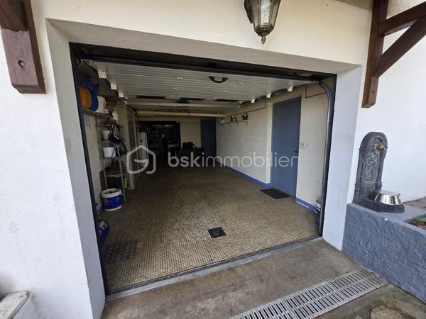 Magnifique Pavillon sur sous-sol de 177m² à Marzy

Exclusif chez BSK Immobilier!!!

Dans le village très prisé de Marzy,  situé proche de toutes les écoles,  les commerces et les commodités, nous vous présentons ce magnifique pavillon élevé sur sous sol construit en 1984, d'une superficie habitable de 177m², comprenant 5 pièces dont salon séjour avec cheminée, cuisine indépendante aménagée et équipée, wc, salle de bain, 2 chambres au rez-de-chaussée, grand palier, dressing, 2 chambres, wc et salle d'eau à l'étage, cellier, cave, buanderie aménagée, grand garage de28m², terrasses et dépendance de jardin, le tout sur un beau terrain d'environ 1000m², arboré, entretenu et entièrement clos avec une vue imprenable sur la campagne Nivernaise .

Au rez-de-chaussée, ce pavillon propose une spacieuse entrée ainsi qu'un dégagement qui dessert toutes les pièces de la maison notamment un grand salon séjour de 32 m², pièce de vie lumineuse qui propose un insert de cheminée, pour de belles soirées au coin du feu, ainsi que deux belles portes fenêtres qui donne sur une grande terrasse en bois.
Le dégagement dessert une grande cuisine indépendante, aménagée et équipée de 23m².
Le rez-de-chaussée se complète de 2 chambres de 11 et 15m², une salle de bain et un wc indépendant.

De la cuisine, un escalier mène à l'étage, dont le grand palier de 25m², dessert deux chambres de 16 et 21m², la plus grande offrant un espace dressing.
L'étage se complète d'une salle d'eau avec wc,, d'un grand dressing et d'une pièce de rangement .

Au sous sol, ce pavillon propose un espace buanderie de 16m², un cellier de 15m², une pièce de rangement de 13m², un atelier de 20m², une cave, ainsi qu'un grand garage de 27m² avec porte de garage motorisée.

Tous les sols de cette maison sont en carrelage (Salon séjour, cuisine, salle de bain, wc, buanderie cellier, véranda, garage) mais aussi en parquet (palier et chambres), elle est composée d'un chauffage au bois (insert) ou électrique, d'une isolation double vitrage PVC imitation bois, ainsi que de volets bois standards.
Ce pavillon dispose de combles parfaitement isolés et d'une toiture en tuiles mécaniques bétons en très bon état.

Côté terrain, cette maison dispose d'un portail motorisé avec console d'accueil , d'une parcelle d'environ 1000 m² de terrain sans vis à vis entièrement clôturée, arborée et très bien entretenue, d'une terrasse en bois qui propose une vue imprenable sur la campagne Nivernaise,  de deux autres terrasses dont une sous appentis, ainsi que d'une dépendnace de jardin,
Côté assainissement, ce pavillon dispose du tout à l'égout conforme.
Il dispose de la fibre internet

Les plus de cette maison :
Sa proximité de toutes les commodités, des commerces et des écoles. La qualité générale du bien parfaitement entretenu avec des grands volumes de pièces dont son salon séjour, sa cuisine indépendante aménagée et équipée, ses 4 chambres et ses 2 salles de bains, sa buanderie aménagée, son garage, ses extérieurs et ses terrasses, son terrain parfaitement entretenu, arboré et totalement clôturé.

Des photos supplémentaires sont disponibles sur BSK IMMOBILIER > Nos conseillers > Olivier FRESLON
Pour tout renseignement complémentaire ou pour une visite, contactez moi au 07.62.78.13.13.

Idéale pour une grande famille, cette maison est un vrai coup de cœur, une opportunité à saisir!!!