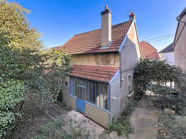 Maison de ville F5 avec dépendances et terrain