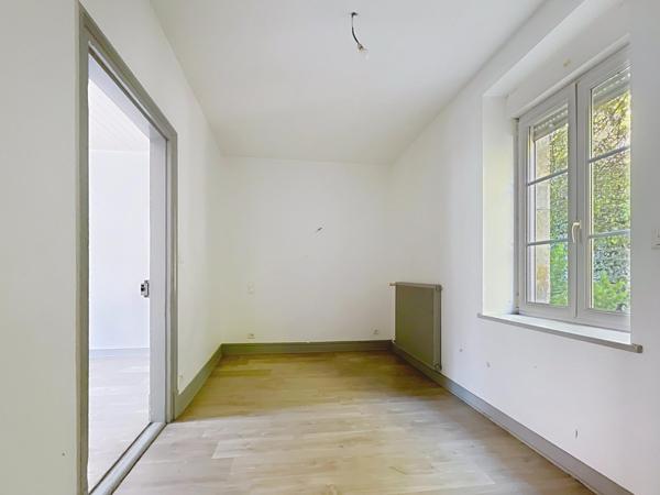 Maison de ville F5 avec dépendances et terrain