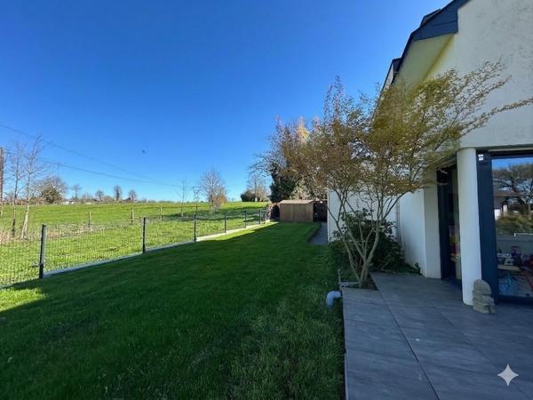 Maison contemporaine au calme à Vezin le Coquet