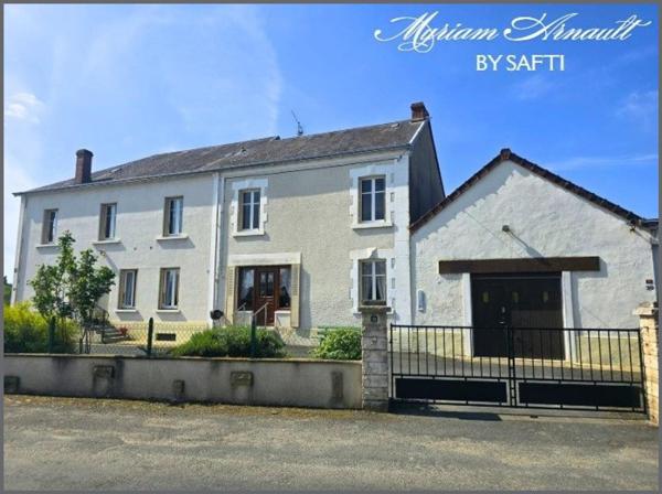 Maison avec 3 hangars et garages terrain attenant