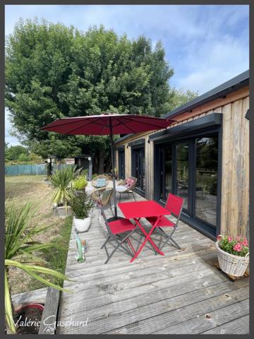 Maison en bois 2 chambres+ bureau sur terrain de 1489 m²