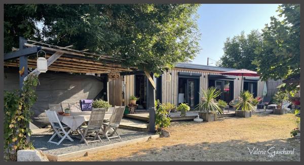 Maison en bois 2 chambres+ bureau sur terrain de 1489 m²