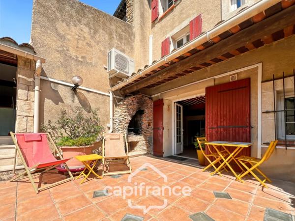 Authentique maison de village de 118 m2 en pierre, chambres climatisées, terrasse de 50 m2, cuisine extérieure, double garage, grenier, trois belles chambres 2 salle de bains, buanderie