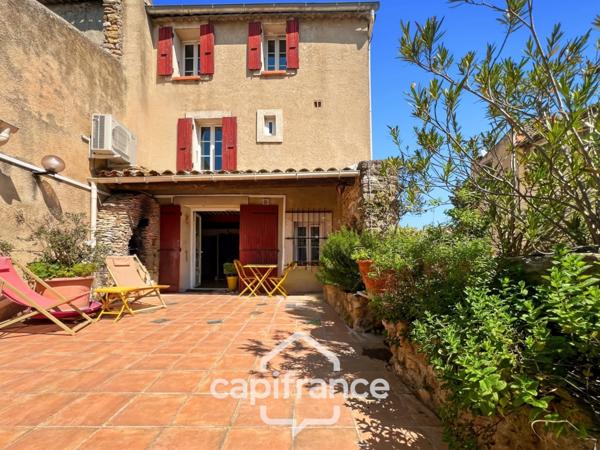 Authentique maison de village de 118 m2 en pierre, chambres climatisées, terrasse de 50 m2, cuisine extérieure, double garage, grenier, trois belles chambres 2 salle de bains, buanderie