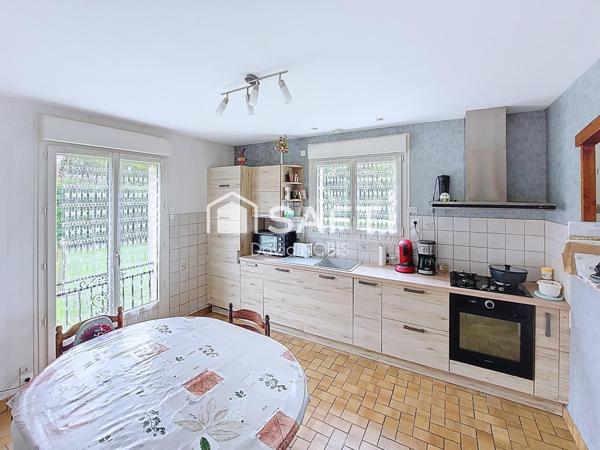 Maison avec terrain et grange