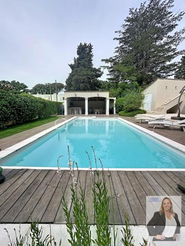 Située dans un quartier recherché de Mougins, cette élégante villa séduit par ses volumes généreux et ses prestations de qualité.

D’une belle superficie, elle offre un espace de vie lumineux ouvert sur une terrasse de 41m2, 4 chambres, dont 3 de plain-pied et une en mezzanine, 2 salles de bain, une buanderie/arrière cuisine, une sous-sol aménageable en salle de sport, spa, cinéma, une cave, un local technique.
La propriété dispose également d’un studio indépendant d'environ 21m2, idéal pour recevoir famille et amis ou envisager un rendement locatif.

À l’extérieur, vous profiterez d’une terrasse spacieuse ombragée, d'un magnifique jardin arboré, parfaitement entretenu, agrémenté d’une grande piscine au sel, d'une douche extérieure et d'un pool housse équipé de 25m2, propice à la détente et aux moments conviviaux. Un terrain de pétanque vient compléter cet espace extérieur typiquement provençal.

En complément : cave et vaste sous-sol aménageable offrant de nombreuses possibilités (salle de sport, cinéma, espace bien-être…).

Les + :
Quartier résidentiel très recherché
3 chambres de plain-pied 
Grandes surfaces et beaux volumes
Piscine avec pool house aménagé
Studio indépendant
Jardin arboré et fleuri
Terrain de pétanque
Nombreux stationnements
Fort potentiel d’aménagement

Un bien rare sur le secteur, à découvrir sans tarder.