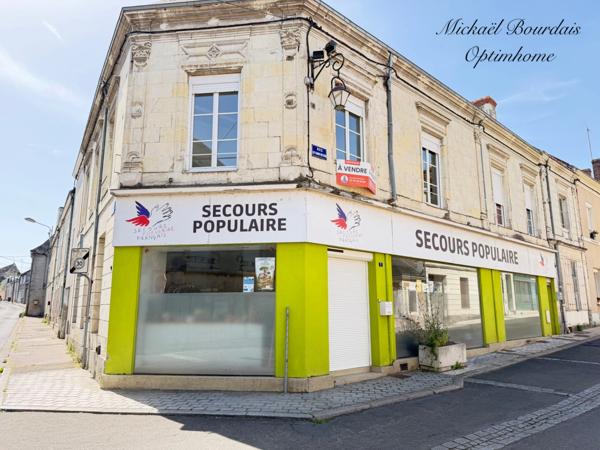 Immeuble de rapport avec local commercial et deux logements – Opportunité d'investissement