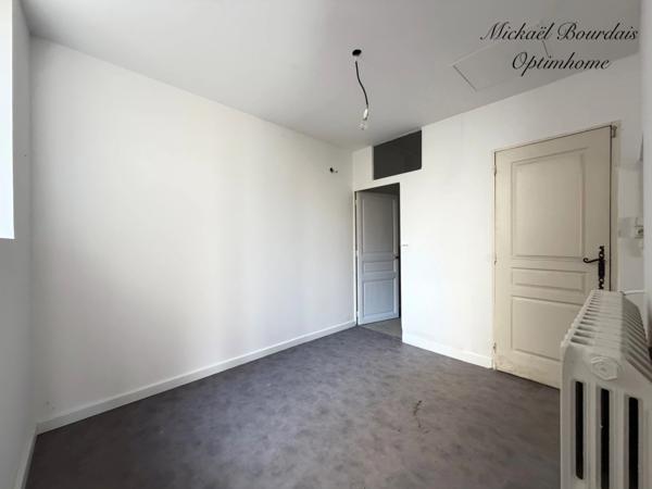 Immeuble de rapport avec local commercial et deux logements – Opportunité d'investissement