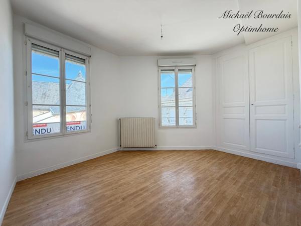 Immeuble de rapport avec local commercial et deux logements – Opportunité d'investissement
