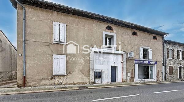 IMMEUBLE DE CARACTERE  AVEC RENDEMENT LOCATIF STABLE ET COMMERCE ETABLI