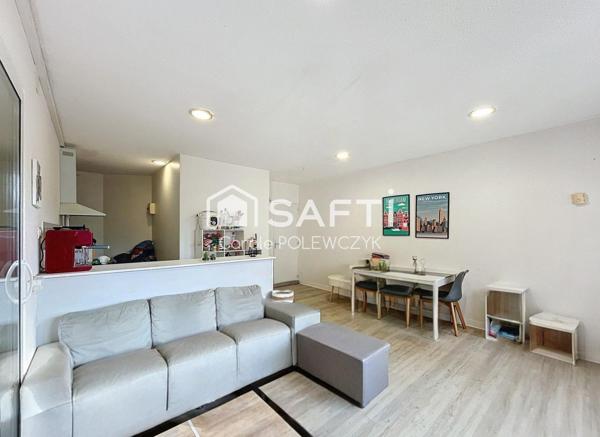 IMMEUBLE DE CARACTERE  AVEC RENDEMENT LOCATIF STABLE ET COMMERCE ETABLI