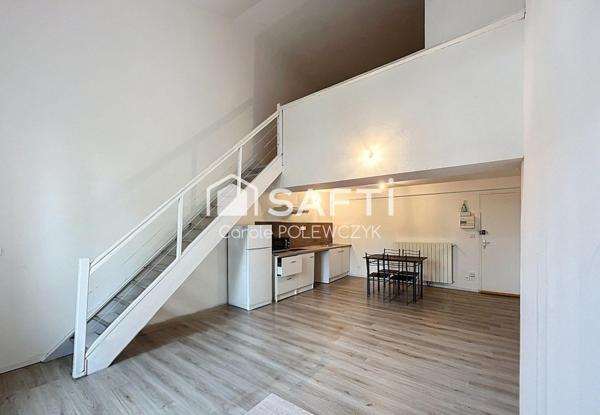 IMMEUBLE DE CARACTERE  AVEC RENDEMENT LOCATIF STABLE ET COMMERCE ETABLI