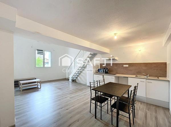 IMMEUBLE DE CARACTERE  AVEC RENDEMENT LOCATIF STABLE ET COMMERCE ETABLI