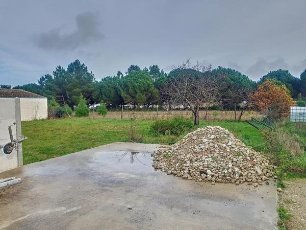 Charmant terrain constructible, au calme et à proximité des services