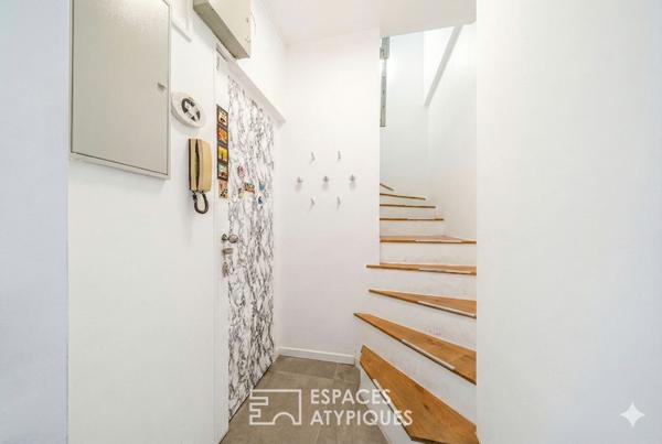 Duplex traversant au dernier étage avec terrasses dans le village Saint-Charles