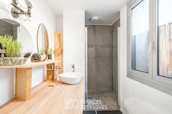 Duplex traversant au dernier étage avec terrasses dans le village Saint-Charles