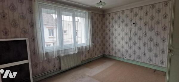 ACHICOURT - Belle Maison de Lotissement avec garage, grenier et jardin SH 91 m² en bon état général