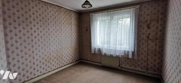 ACHICOURT - Belle Maison de Lotissement avec garage, grenier et jardin SH 91 m² en bon état général