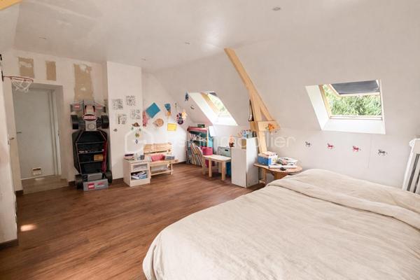 Vous recherchez une maison avec de la pierre, du bois, de la verdure et du calme... une maison vous offrant un beau potentiel, avec quelques travaux de finitions afin de la mettre à votre goût ? J'ai peut-être ça, lisez la suite !
Dès votre arrivée dans le chemin, vous pourrez succomber au charme de cette maison en pierre avec son extension bois....
Nous commencerons la visite par une vaste entrée, elle distribue la pièce de vie lumineuse de 40m2 avec sa grande baie donnant accès direct au jardin,  elle comprend le salon-séjour et la cuisine aménagée et équipée récente. La pièce de vie est une extension bois qui a été construite en 2020.  Nous poursuivrons avec un espace buanderie de 6m2, un wc séparé, et une suite parentale de 21m2 avec un espace chambre, un dressing et une salle d'eau privative. 
Direction ensuite l'étage, une vaste mezzanine de 20m2 pouvant aisément accueillir un espace bureau, une salle de jeux distribue une salle de bain de 6m2, un wc séparé, une chambre de 9m2 et deux autres chambres de 13m2 au sol. Le mode de chauffage est électrique. Plusieurs menuiseries ont été changées en pvc double vitrage, la grande baie du salon en double vitrage sera à envisager. La taxe foncière est de 640€. 
Allons à l'extérieur, entourée de végétation, vous pourrez profiter en toute tranquillité, sans aucun vis à vis, de la parcelle de 3200m2. Non attenant à la maison un atelier vous y attend pour y mettre voitures, motos, bricolage etc... . Vous souhaiteriez pouvoir stationner votre voiture à toute proximité de l'entrée de votre maison ? Pas de soucis, vous pourrez aisément créer un carport sur un des cotés de la maison. Un puits, non raccordé à la maison, est présent. 
Alors ce bien semble correspondre à vos critères de recherche ? Ne tardez pas, appelez-moi !