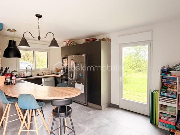 Vous recherchez une maison avec de la pierre, du bois, de la verdure et du calme... une maison vous offrant un beau potentiel, avec quelques travaux de finitions afin de la mettre à votre goût ? J'ai peut-être ça, lisez la suite !
Dès votre arrivée dans le chemin, vous pourrez succomber au charme de cette maison en pierre avec son extension bois....
Nous commencerons la visite par une vaste entrée, elle distribue la pièce de vie lumineuse de 40m2 avec sa grande baie donnant accès direct au jardin,  elle comprend le salon-séjour et la cuisine aménagée et équipée récente. La pièce de vie est une extension bois qui a été construite en 2020.  Nous poursuivrons avec un espace buanderie de 6m2, un wc séparé, et une suite parentale de 21m2 avec un espace chambre, un dressing et une salle d'eau privative. 
Direction ensuite l'étage, une vaste mezzanine de 20m2 pouvant aisément accueillir un espace bureau, une salle de jeux distribue une salle de bain de 6m2, un wc séparé, une chambre de 9m2 et deux autres chambres de 13m2 au sol. Le mode de chauffage est électrique. Plusieurs menuiseries ont été changées en pvc double vitrage, la grande baie du salon en double vitrage sera à envisager. La taxe foncière est de 640€. 
Allons à l'extérieur, entourée de végétation, vous pourrez profiter en toute tranquillité, sans aucun vis à vis, de la parcelle de 3200m2. Non attenant à la maison un atelier vous y attend pour y mettre voitures, motos, bricolage etc... . Vous souhaiteriez pouvoir stationner votre voiture à toute proximité de l'entrée de votre maison ? Pas de soucis, vous pourrez aisément créer un carport sur un des cotés de la maison. Un puits, non raccordé à la maison, est présent. 
Alors ce bien semble correspondre à vos critères de recherche ? Ne tardez pas, appelez-moi !