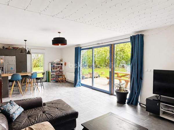 Vous recherchez une maison avec de la pierre, du bois, de la verdure et du calme... une maison vous offrant un beau potentiel, avec quelques travaux de finitions afin de la mettre à votre goût ? J'ai peut-être ça, lisez la suite !
Dès votre arrivée dans le chemin, vous pourrez succomber au charme de cette maison en pierre avec son extension bois....
Nous commencerons la visite par une vaste entrée, elle distribue la pièce de vie lumineuse de 40m2 avec sa grande baie donnant accès direct au jardin,  elle comprend le salon-séjour et la cuisine aménagée et équipée récente. La pièce de vie est une extension bois qui a été construite en 2020.  Nous poursuivrons avec un espace buanderie de 6m2, un wc séparé, et une suite parentale de 21m2 avec un espace chambre, un dressing et une salle d'eau privative. 
Direction ensuite l'étage, une vaste mezzanine de 20m2 pouvant aisément accueillir un espace bureau, une salle de jeux distribue une salle de bain de 6m2, un wc séparé, une chambre de 9m2 et deux autres chambres de 13m2 au sol. Le mode de chauffage est électrique. Plusieurs menuiseries ont été changées en pvc double vitrage, la grande baie du salon en double vitrage sera à envisager. La taxe foncière est de 640€. 
Allons à l'extérieur, entourée de végétation, vous pourrez profiter en toute tranquillité, sans aucun vis à vis, de la parcelle de 3200m2. Non attenant à la maison un atelier vous y attend pour y mettre voitures, motos, bricolage etc... . Vous souhaiteriez pouvoir stationner votre voiture à toute proximité de l'entrée de votre maison ? Pas de soucis, vous pourrez aisément créer un carport sur un des cotés de la maison. Un puits, non raccordé à la maison, est présent. 
Alors ce bien semble correspondre à vos critères de recherche ? Ne tardez pas, appelez-moi !