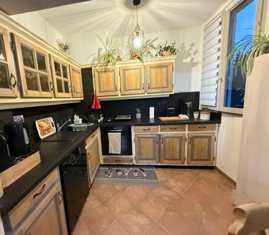 Appartement de Type 2 avec garage et jardin