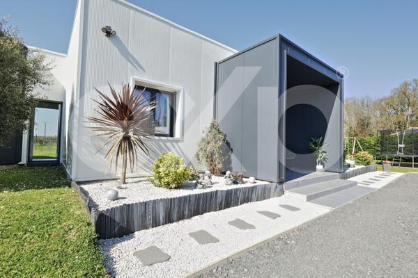 Maison d’architecte 150 m² Saint-Sauveur - 4 chambres - Double garage - 1 800 m² de terrain