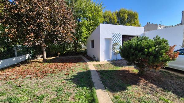 Maison à étage avec jardin clos et garage
