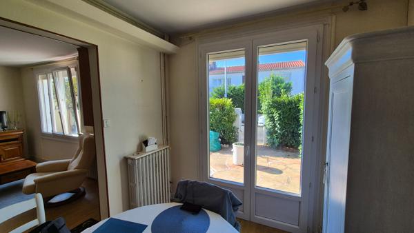 Maison à étage avec jardin clos et garage