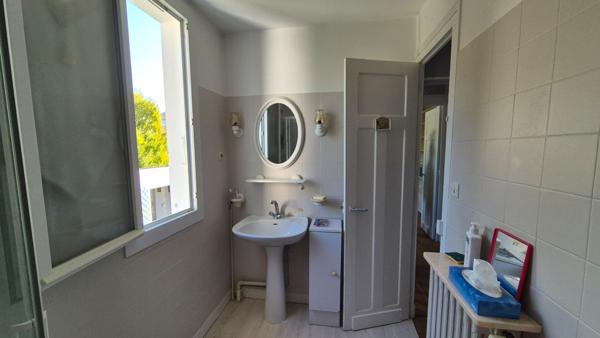 Maison à étage avec jardin clos et garage