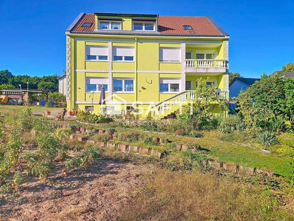 Grande maison individuelle avec fort potentiel