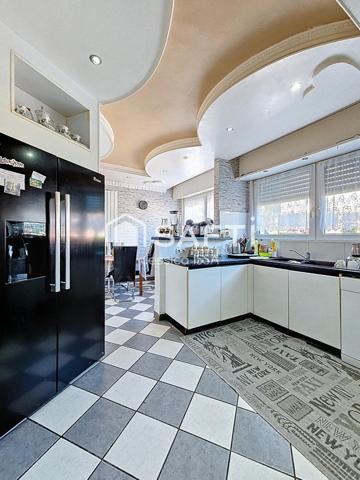 Grande maison individuelle avec fort potentiel