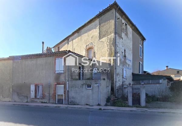 Maison de ville avec terrasse et petit jardin