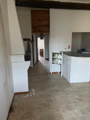 immeuble de rapport situé au coeur du village