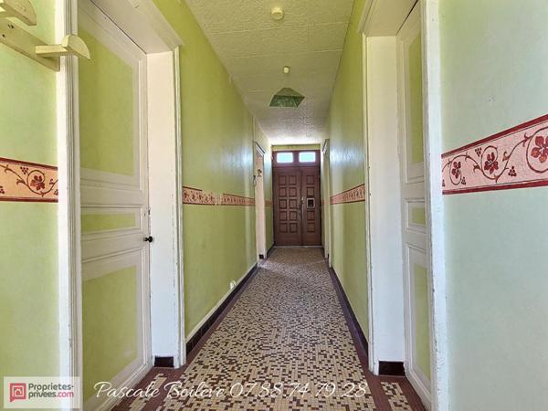 Maison de Bourg avec cour et jardin - Vernantes (49390)