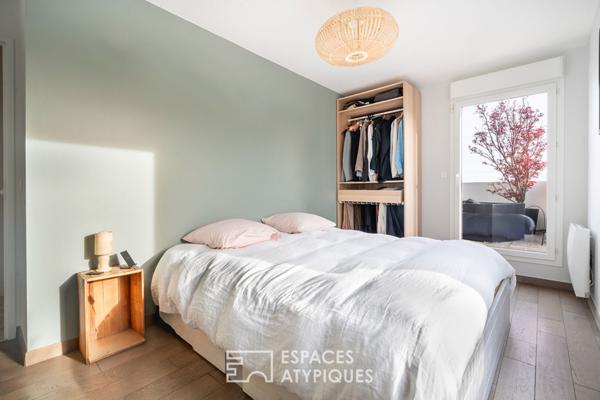 Appartement en dernier étage avec terrasse face à la Seine