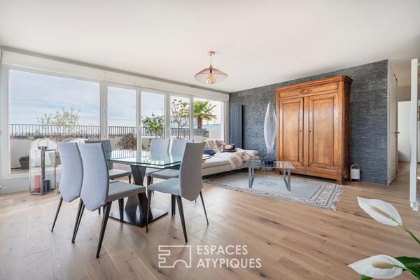 Appartement en dernier étage avec terrasse face à la Seine