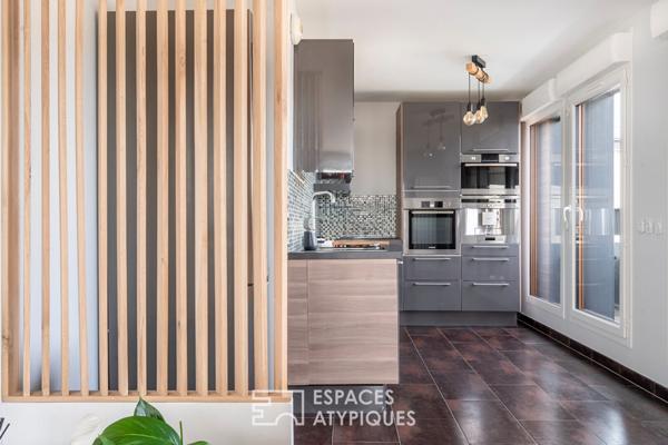 Appartement en dernier étage avec terrasse face à la Seine