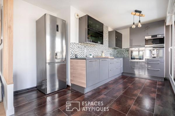 Appartement en dernier étage avec terrasse face à la Seine