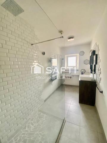 Immeuble de rapport de 308m2 avec cour/jardin, garage + batisse