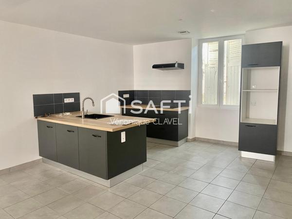 Immeuble de rapport de 308m2 avec cour/jardin, garage + batisse