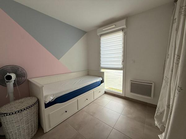Appartement de type 3 avec grande terrasse et 2 places de parking