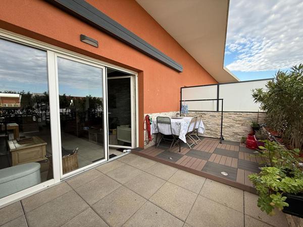 Appartement de type 3 avec grande terrasse et 2 places de parking