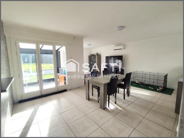 Maison semi-individuelle de semi-plain pied avec sous sol ,3 chambres et jardin